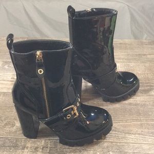 Fashion Nova size 6 patent black boots.